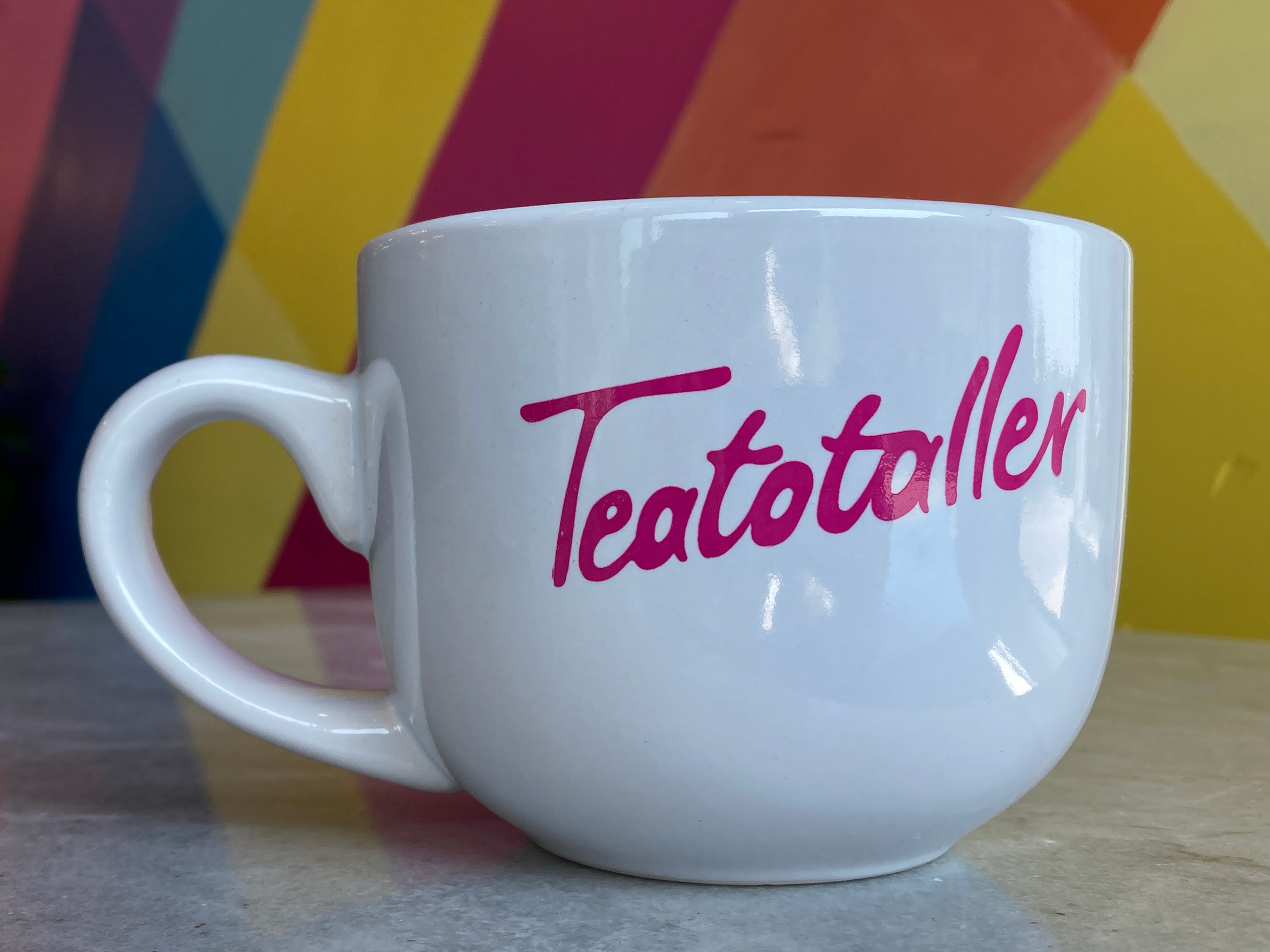 White mug with pink font - Teatotaller